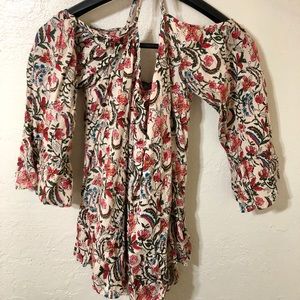 Exposed shoulder blouse